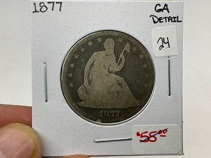 lot 24 image: 1877 Seated Silver Half Dollar