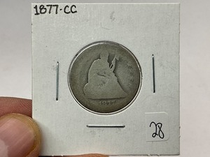 lot 28 image: 1877-CC Seated Silver Quarter