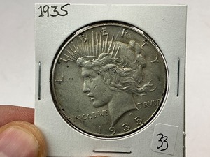 lot 33 image: 1935 Silver Peace Dollar