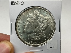 lot 101 image: 1884-O Morgan Silver Dollar