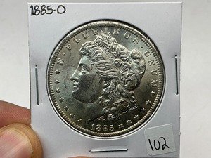 lot 102 image: 1885-O Morgan Silver Dollar