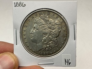 lot 146 image: 1886 Morgan Silver Dollar