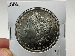lot 147 image: 1886 Morgan Silver Dollar