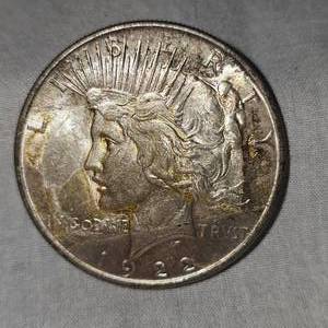 lot 46 image: 1922 Peace Dollar $1 wGold Toning