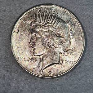 lot 48 image: 1926 Peace Dollar $1 VF wToning