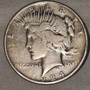lot 63 image: 1924  Peace Dollar $1