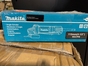 lot 115 image: Makita 7.5 Amp 4-12 in. Corded Paddle Switch Angle Grinder