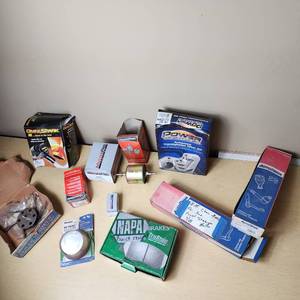 lot 29 image: Various Automotive Parts including NAPA Brakes, Power Torque Transmission Filter Kit, and MicroGard Fuel Filters - See Pics