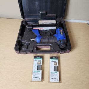 lot 54 image: Campbell Hausfeld 18-Gauge Pneumatic Brad Nailer Set with Case and Nails