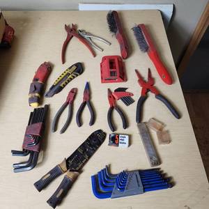 lot 57 image: Assorted Hand Tools including Pliers, Wire Strippers, and Hex Keys