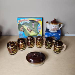 lot 130 image: Ceramic Tea Pot, Mini  Mugs, Slip n Slide, and Crockery