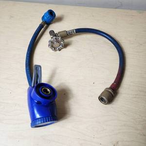 lot 141 image: Lot of Automotive AC Refrigerant Charging Hoses and Gauge