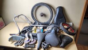 lot 280 image: Mixed Bicycle Parts and Accessories including Kenda Bicycle Tube, Bell Brake Cable Set, Handlebars, and Pedals