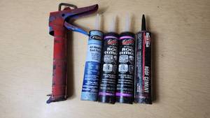 lot 282 image: Jetcoat All-Weather Roof Patch and Black Jack Roof Cement with Caulking Gun