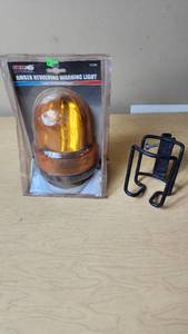 lot 295 image: Amber Revolving Warning Light with Metal Bracket