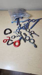 lot 332 image: Eye bolts and hooks including red and black painted options, various sizes and types