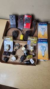 lot 335 image: Westinghouse Light Bulbs and Electrical Plugs and Accessories