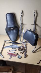 Harley Davidson and Other Motorcycle Parts Set including Sportster Seat, Backrest, and Various Accessories