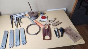 lot 369 image: Assorted Hardware and Tools including Shelf Brackets, Wooden Dowels, and Cable Spool