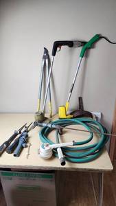 lot 406 image: Garden Tools and Equipment including Weed Eater Grass Trimmer, Hose, and Accessories