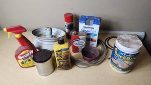 lot 456 image: Assorted Garage and Maintenance Supplies including Wolman DeckBrite, Rust-Oleum NeverWet, and Sevin Bug Killer
