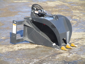lot 380 image: Wolverine 16 Skid Steer StumpRock Bucket