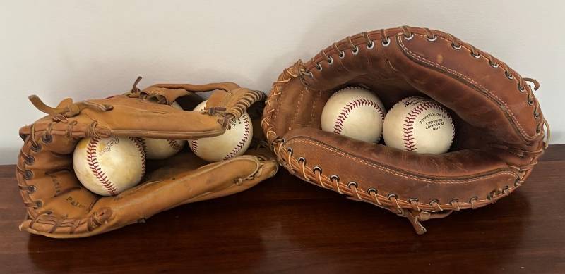 lot 113R image: MB - Set of 2 Vintage Baseball Gloves and 5 Balls by Rawlings and Wilson