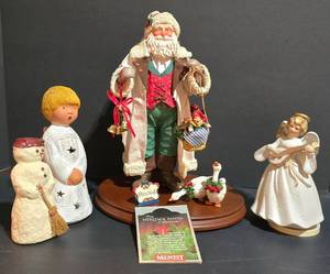 lot 481K image: LL-S - Holiday Figurine Collection Midwest Heritage Santa Pere Noel, Angel Music Box, Caroler Candle Holder
