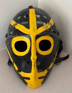 lot 234R image: LL  - Vintage Black and Yellow Goalie Hockey Mask with Straps