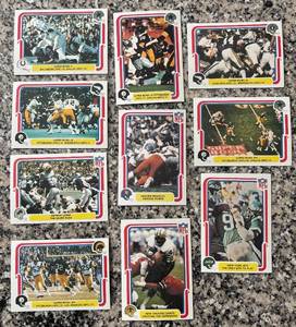 lot 403R image: K - Collection of Vintage NFL Football Sports Cards Featuring Super Bowl and Team Action Shots