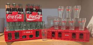 lot 440R image: LLS - Coca-Cola Collectible Lot with Glass Bottles, Branded Glasses and Crates