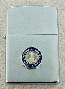 lot 598C image: K - Zippo Lighter with Universitas Dukiana Seal