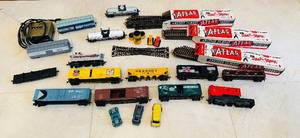lot 617C image: LR - HO Scale Train Set with Tyco Transformer, Track, Rail Cars, and Hot Wheels Vehicles