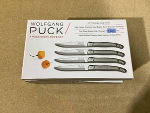 lot 100 image: LOT OF 5 Wolfgang Puck 4 Piece steak knife sets