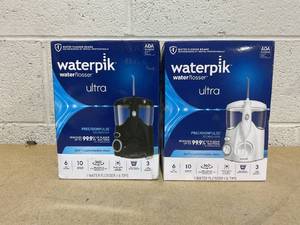 lot 268 image: LOT OF 2 Waterpik Waterflosser Ultra Black & White