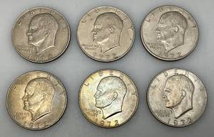 lot 9 image: 1972 Plain No Mint Mark Eisenhower One Dollar Coins