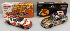 lot 55 image: Misc. NASCAR 124 Scale Die Cast Stock Cars Kevin Harvick &amp Martin Truex Jr. in Original Boxes
