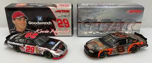 lot 56 image: Misc. NASCAR 124 Scale Die Cast Stock Cars Kevin Harvick &amp Dale Jr. Clear Stock Car in Original Boxes