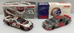 lot 58 image: Misc. NASCAR 124 Scale Die Cast Stock Cars Kevin Harvick Clear Stock Car &amp Dale Jr. Born On Date 17 Feb. 2005 in Original Boxes