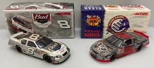 lot 60 image: Misc. NASCAR 124 Scale Die Cast Stock Cars Kevin Harvick Clear Stock Car &amp Dale Jr. Born On Date 17 Feb. 2005 in Original Boxes