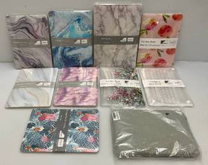 lot 128 image: Misc. Decorative Mac Book Protectors (NEW) Factory Sealed)