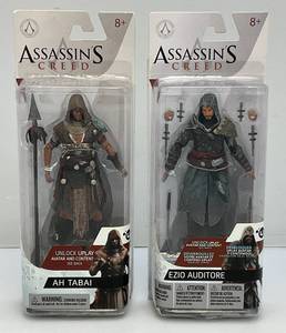 lot 155 image: Collectible McFarlane Toys ASSASSINS CREED (Ezio  Auditore & Ah Tabai) Action Figures (New Old Stock)