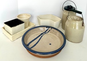 lot 241 image: Stoneware pottery set including Cobalt-glazed plate, Cream-glazed containers, and Lidded jars.