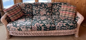 lot 17 image: Sofa with Floral Teal Upholstery on Wicker Frame
