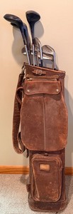lot 128 image: Vintage Hughes Patent Leather Golf Bag with Walter Hagen Irons