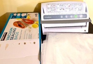 lot 106 image: FoodSaver V3240 Vacuum Sealer with Bags & Accessories