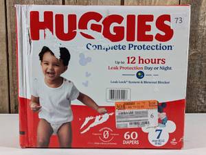 lot 73 image: Huggies Complete Protection Baby Diapers, Size 7, 41 lbs, 60 ct