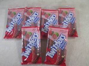 lot 129 image: (B-1) 6 Packages of Twizzlers Tropi...