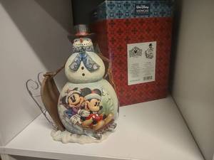 lot 64 image: Disney Traditions Snowman A Sporting Good time