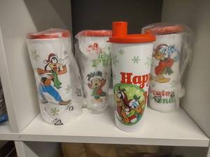 lot 69 image: Vintage Tupperware DIsney Holiday Cups with Lids Mickey, Goofy, Donald Duck